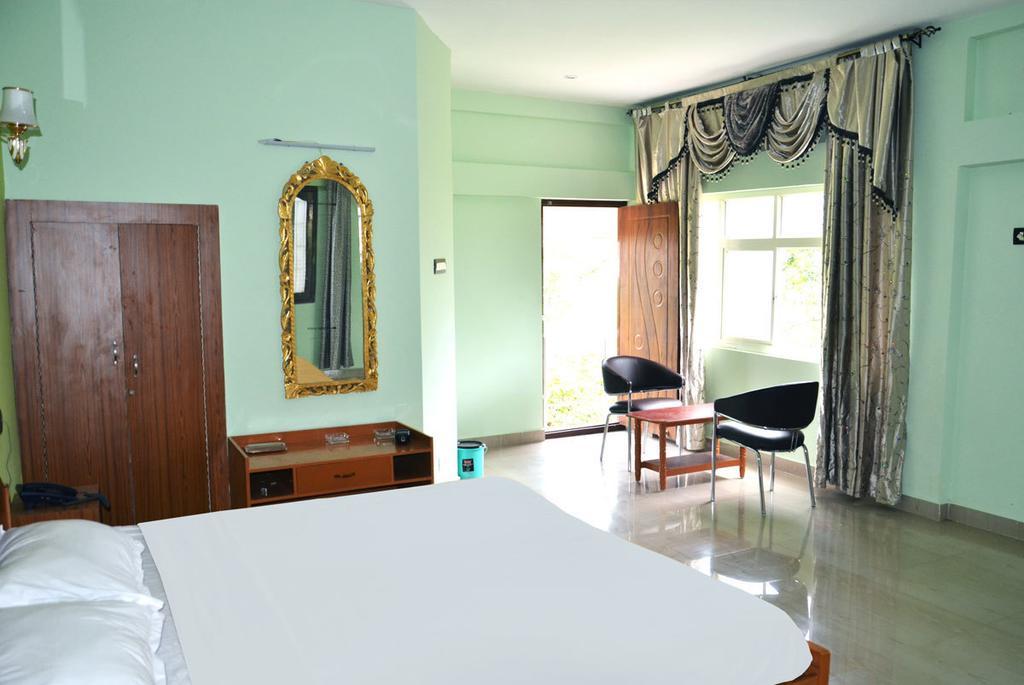 La Flora Paradise Residency ,Jerkaud Szoba fotó
